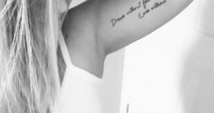 Female inner bicep tattoo. "Dream without fear, love without limits."
