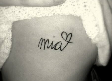 My little girls name TATTOO on my left side, ribs